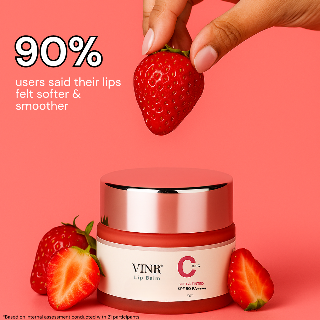 Lip balm jar with strawberries on a pink background, featuring user feedback.